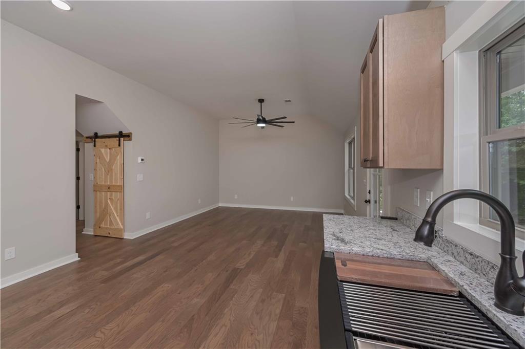 15 Weaver Street Buchanan, GA 30113 - Photo 11 of 22 wooden floor in a kitchen