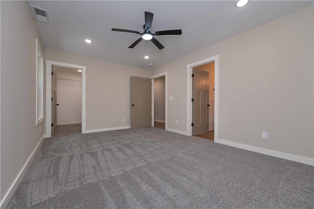 15 Weaver Street Buchanan, GA 30113 - Photo 15 of 22 a view of an empty room with a ceiling fan