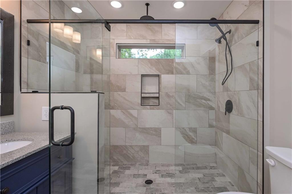 15 Weaver Street Buchanan, GA 30113 - Photo 18 of 22 a bathroom with a shower and a sink