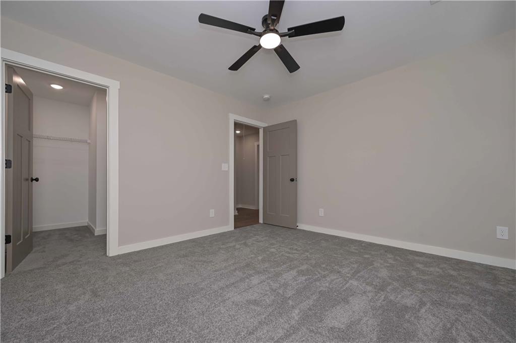 15 Weaver Street Buchanan, GA 30113 - Photo 19 of 22 an empty room with closet and windows