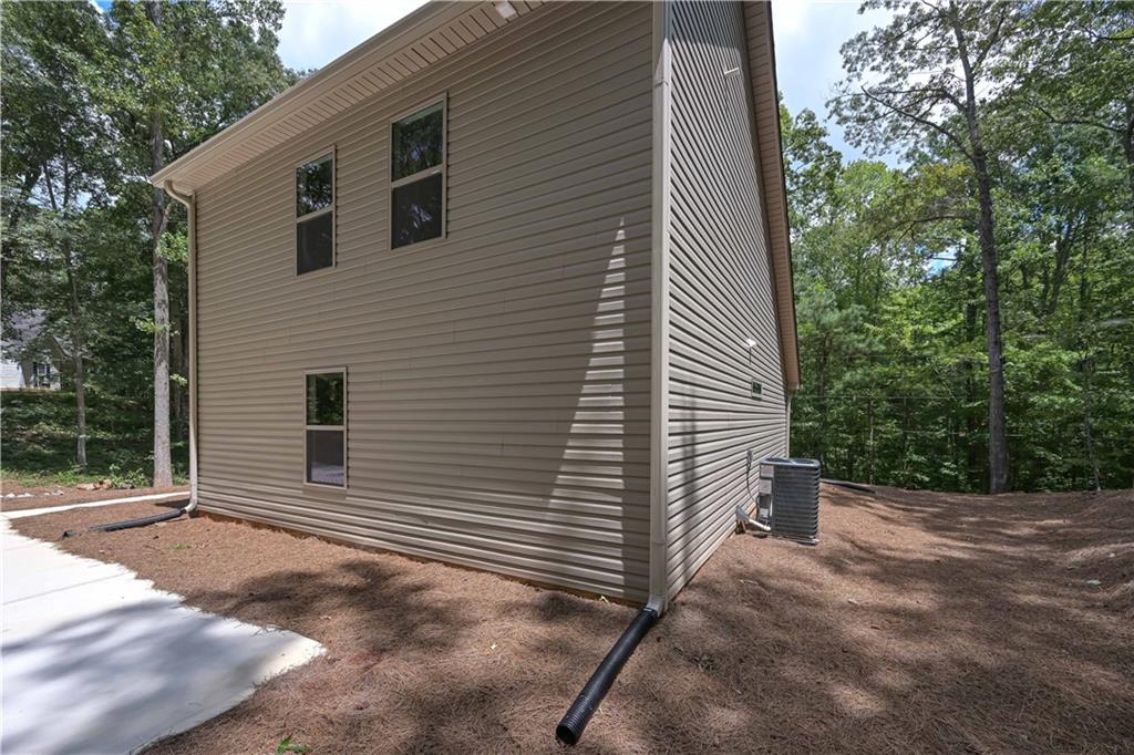 15 Weaver Street Buchanan, GA 30113 - Photo 7 of 22 a backyard of a house