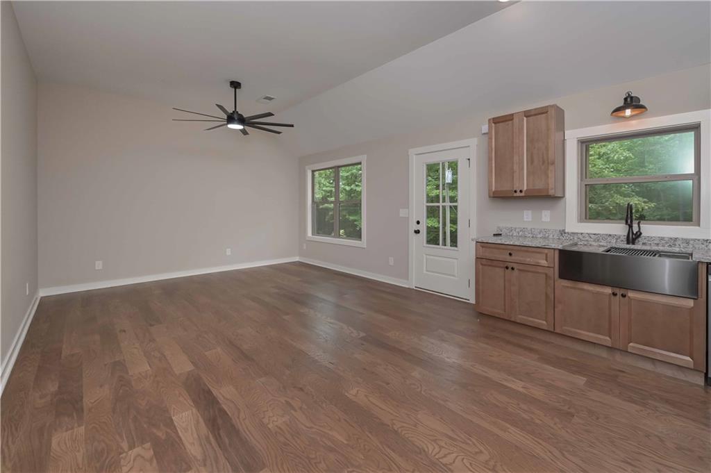 15 Weaver Street Buchanan, GA 30113 - Photo 10 of 22 a kitchen with a sink cabinets and window