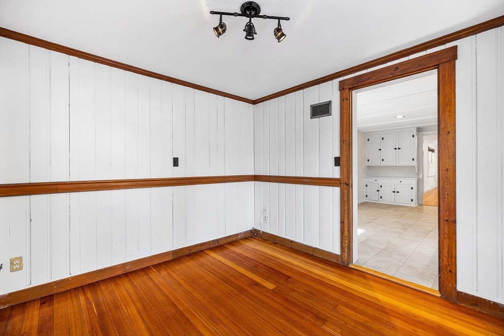 337 Edgell Road Framingham, MA 01701 - Photo 13 of 36 a view of empty room with wooden floor