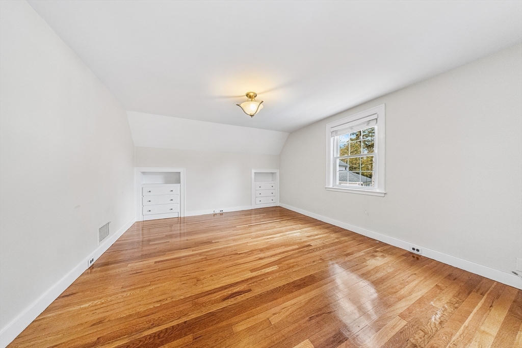337 Edgell Road Framingham, MA 01701 - Photo 29 of 36 a view of empty room with wooden floor and fan