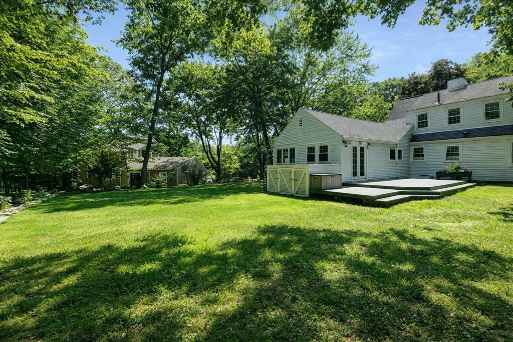 337 Edgell Road Framingham, MA 01701 - Photo 34 of 36 a front view of a house with a yard