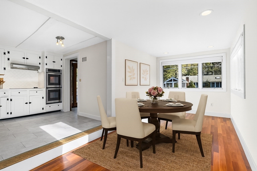 337 Edgell Road Framingham, MA 01701 - Photo 10 of 36 a view of a dining room with furniture and wooden floor