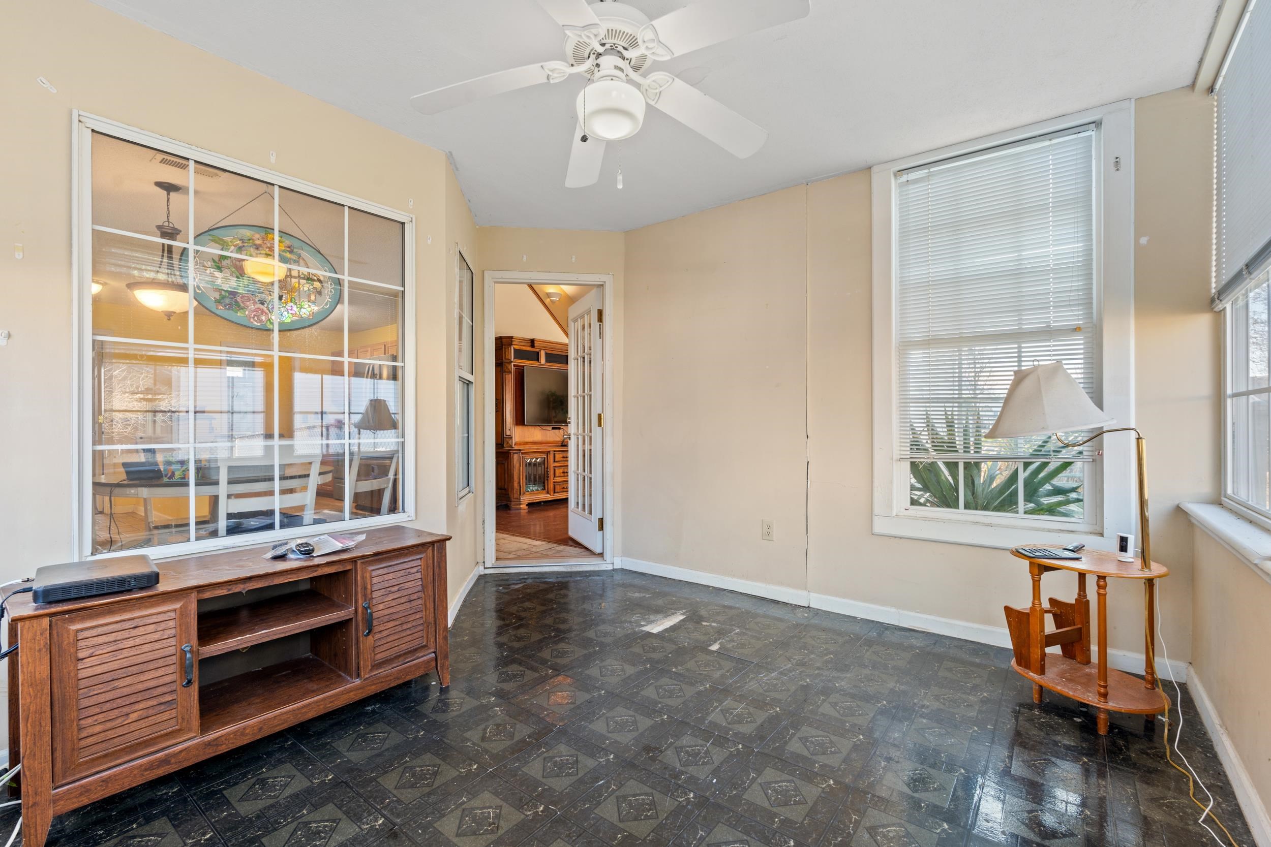 539 Drake Lane Surfside Beach, SC 29575 - Photo 11 of 38 Unfurnished room with ceiling fan and dark floors