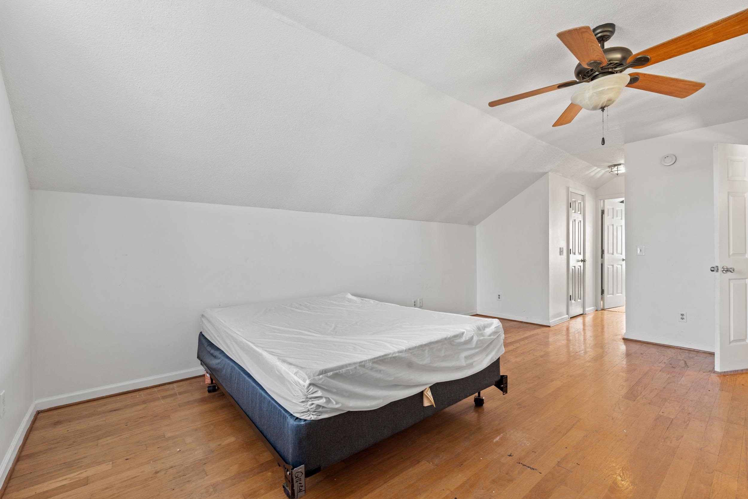 539 Drake Lane Surfside Beach, SC 29575 - Photo 22 of 38 Bedroom featuring vaulted ceiling, light wood-type flooring, and ceiling fan