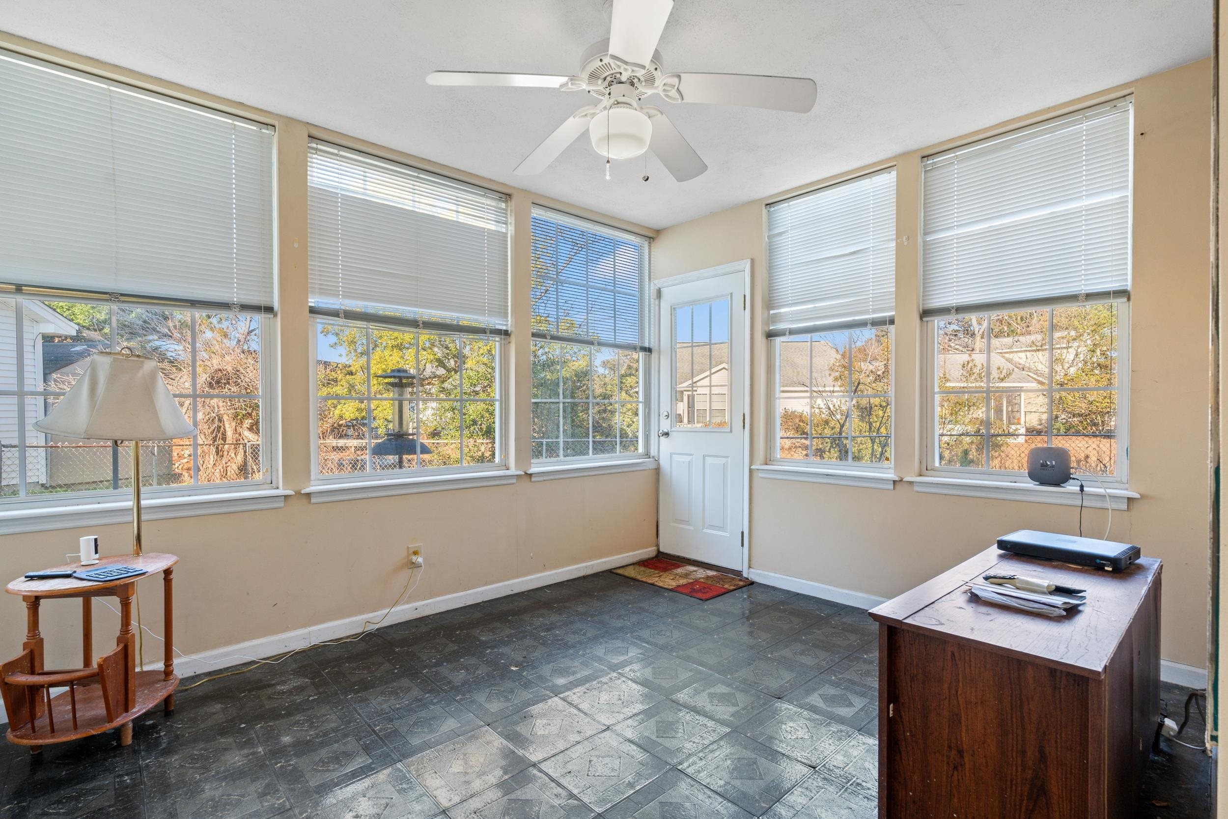 539 Drake Lane Surfside Beach, SC 29575 - Photo 10 of 38 Unfurnished sunroom with plenty of natural light and tile patterned floors