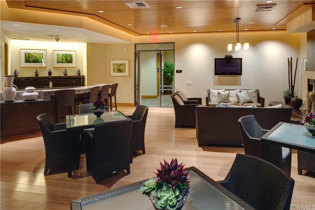 402 Rockefeller, Unit 406 Irvine, CA 92612 - Photo 23 of 35 a view of a dining room with furniture