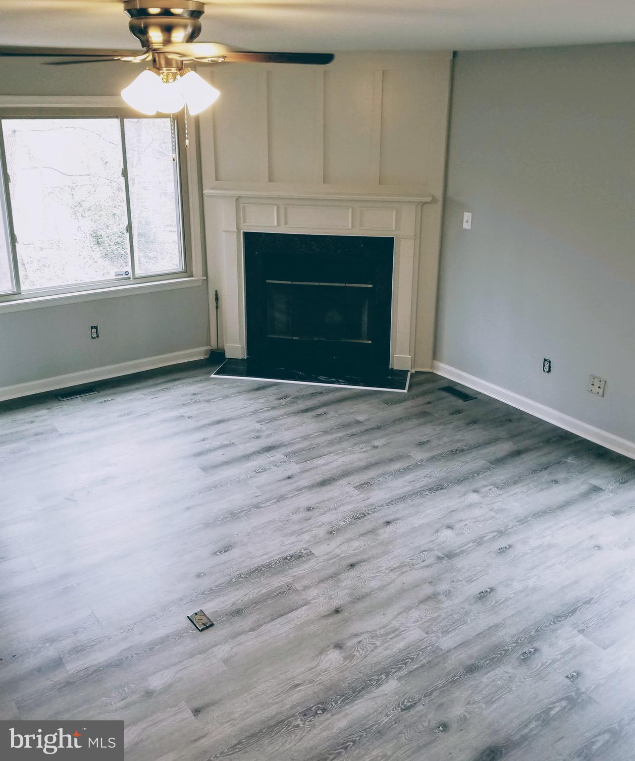 3701 Roxbury Lane Alexandria, VA 22309 - Photo 4 of 10 Wood burning fireplace with marble surround
