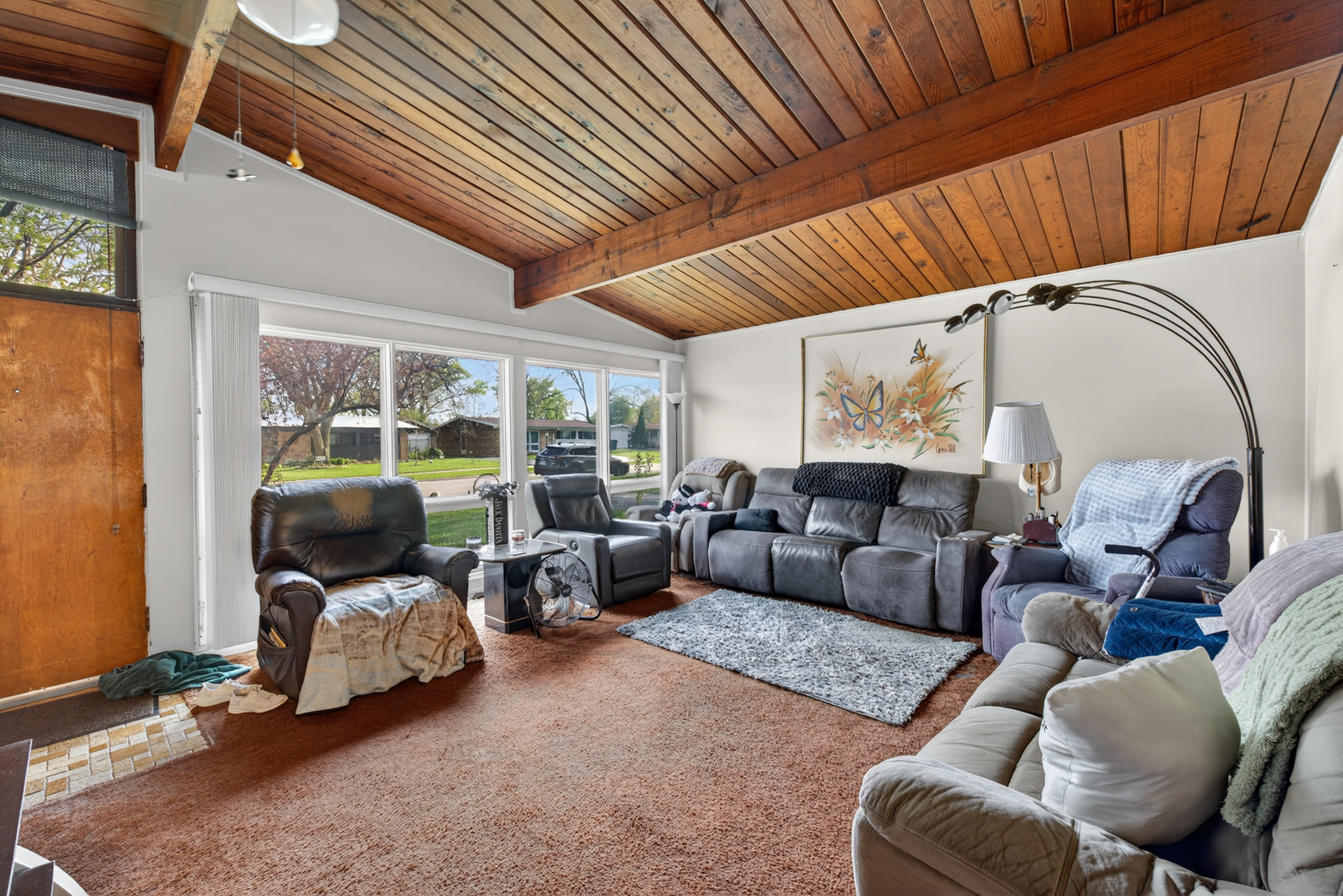 308 Natoma Avenue Addison, IL 60101 - Photo 5 of 21 a living room with furniture and a large window