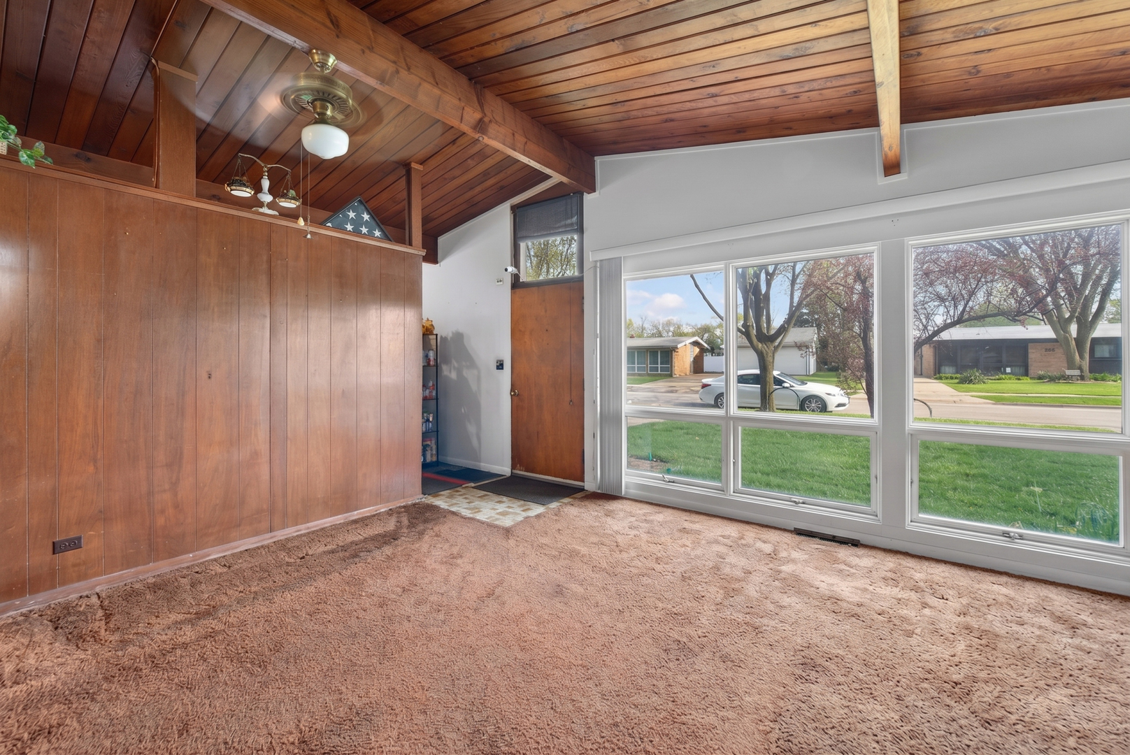 308 Natoma Avenue Addison, IL 60101 - Photo 8 of 21 a view of a room with wooden floor and outer view