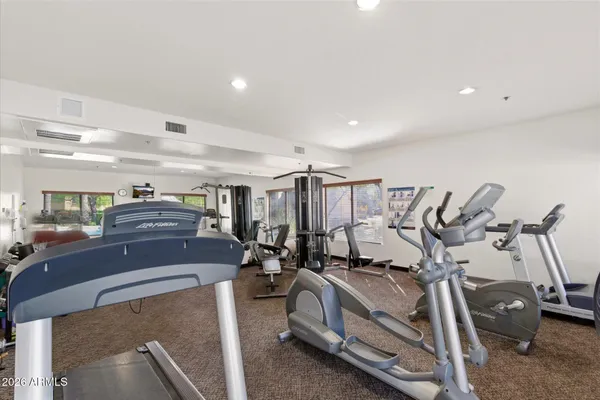 a view of empty room with stairs