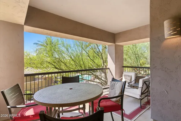 a view of a dining room with furniture window and outside view