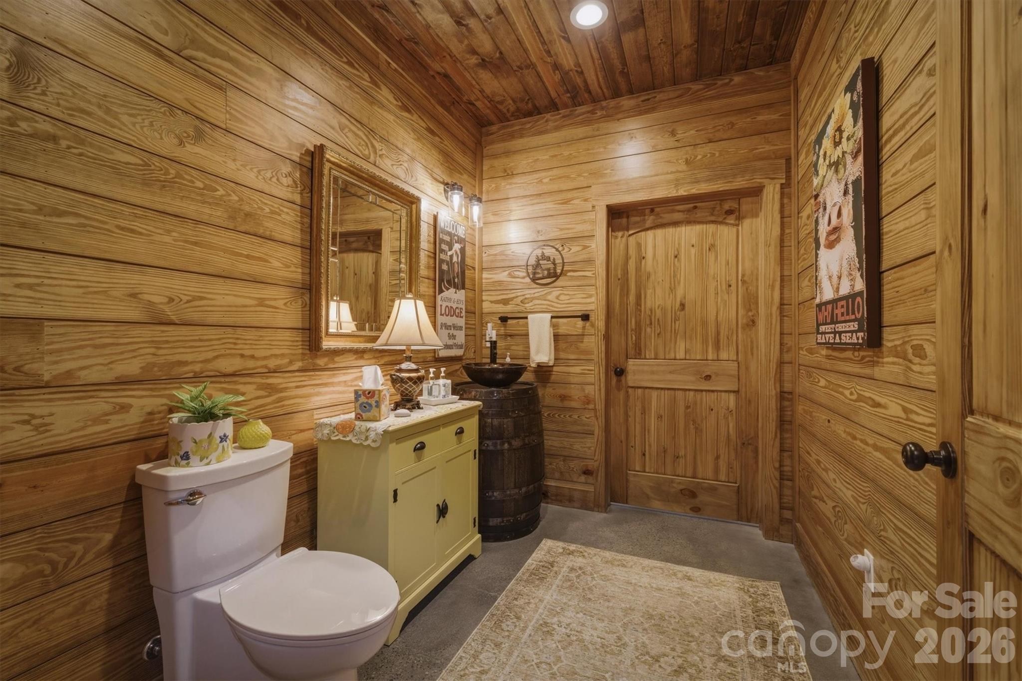 7490 Oak Ridge Church Road Connelly Springs, NC 28612 - Photo 19 of 44 a bathroom with a sink a toilet and shower