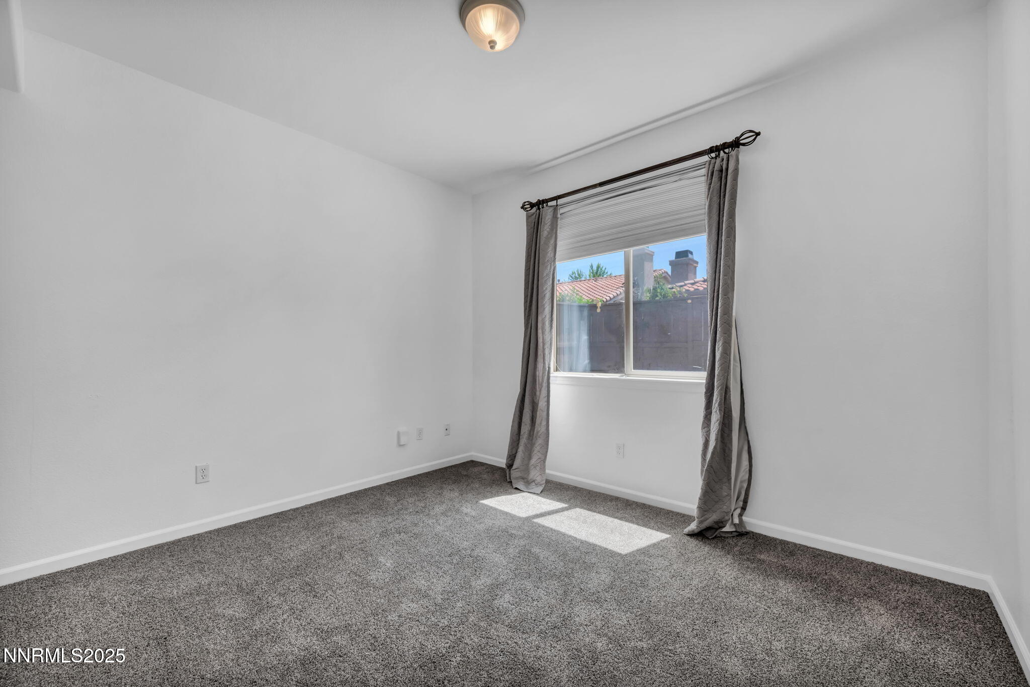 420 Miesque Court Reno, NV 89521 - Photo 17 of 43 a view of an empty room with closet and mirror