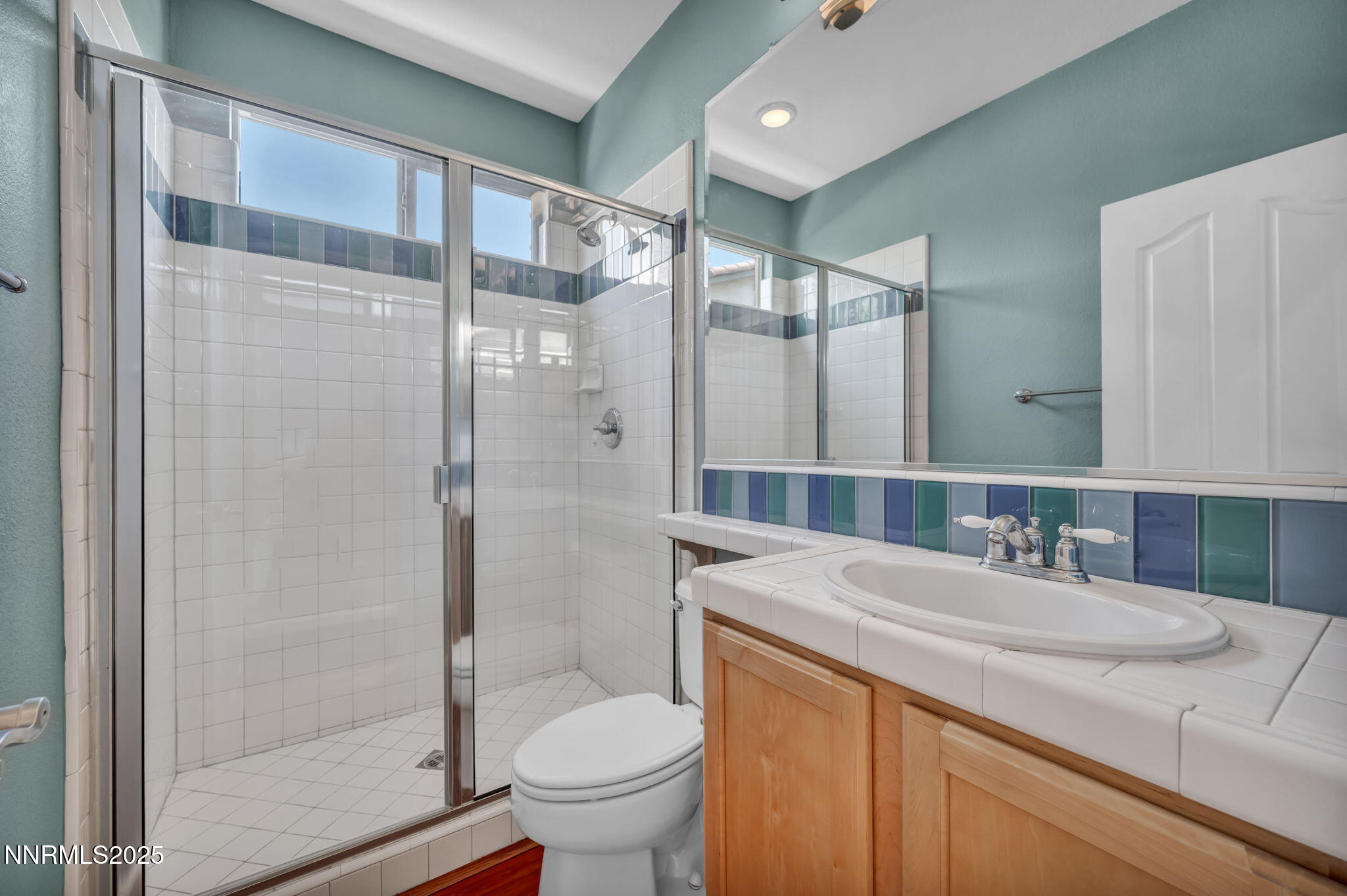 420 Miesque Court Reno, NV 89521 - Photo 19 of 43 a bathroom with a sink toilet and shower