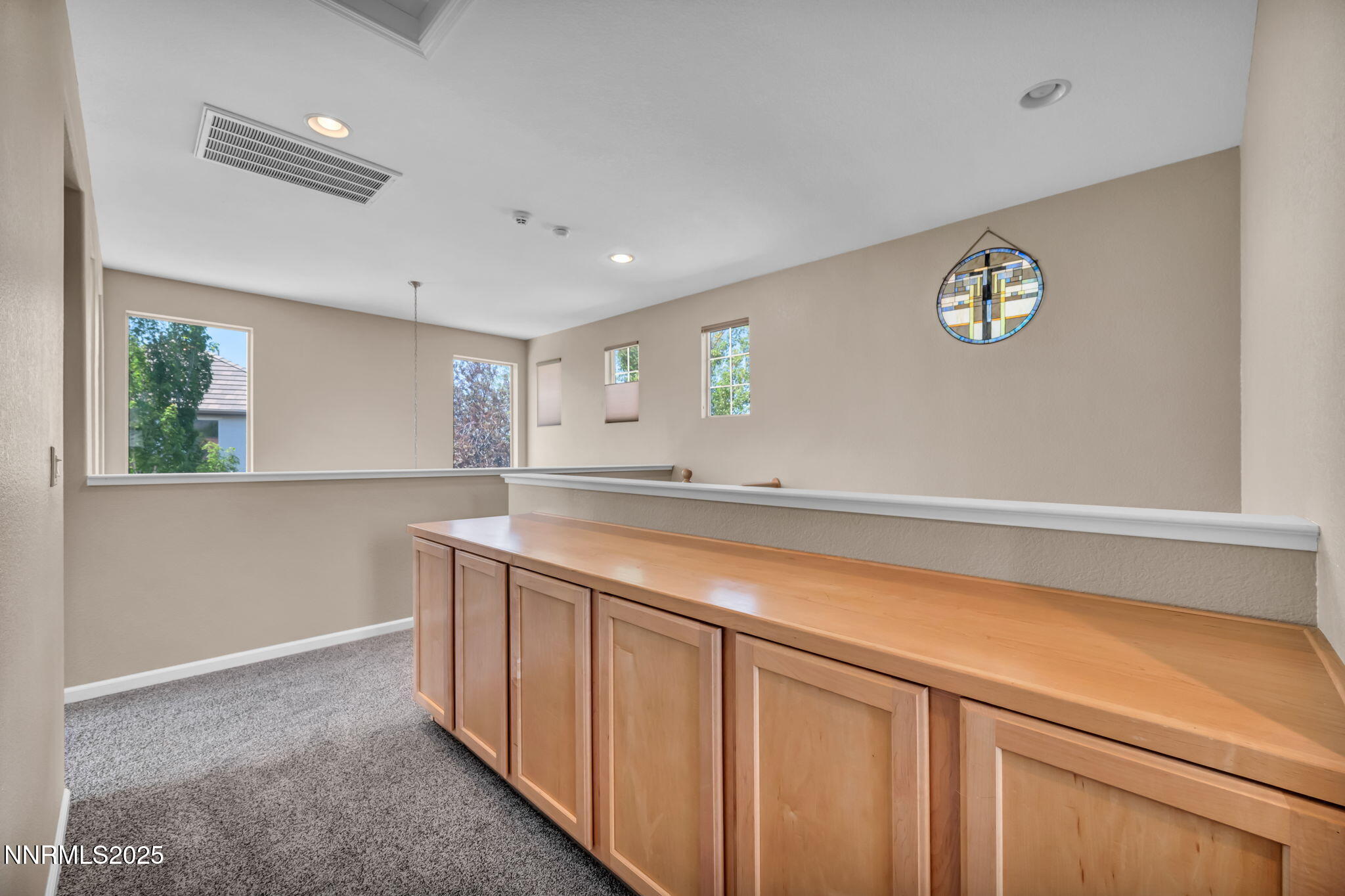 420 Miesque Court Reno, NV 89521 - Photo 23 of 43 a kitchen with stainless steel appliances granite countertop a sink and a granite counter tops with large windows