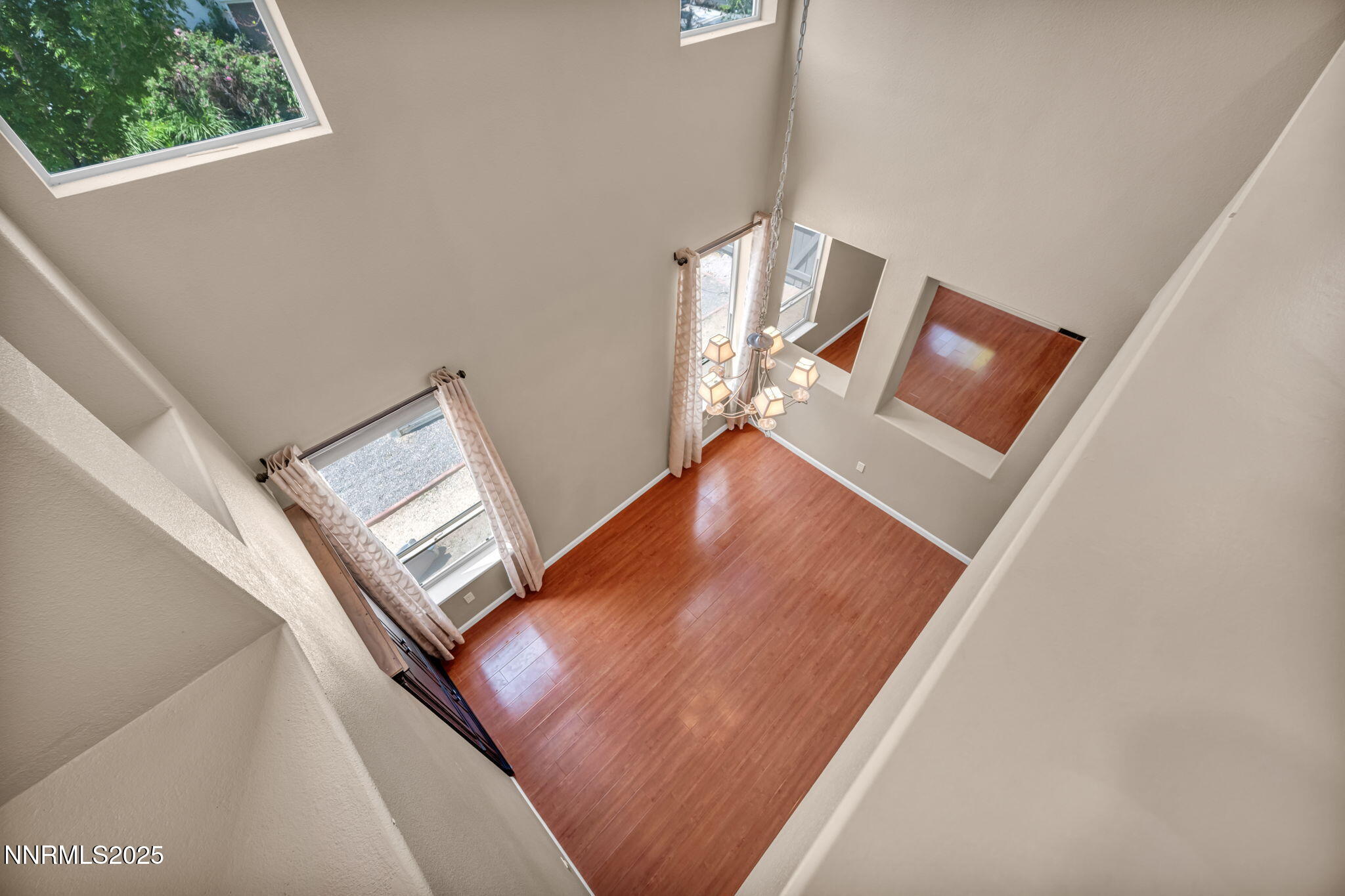 420 Miesque Court Reno, NV 89521 - Photo 24 of 43 a view of staircase with wooden floor