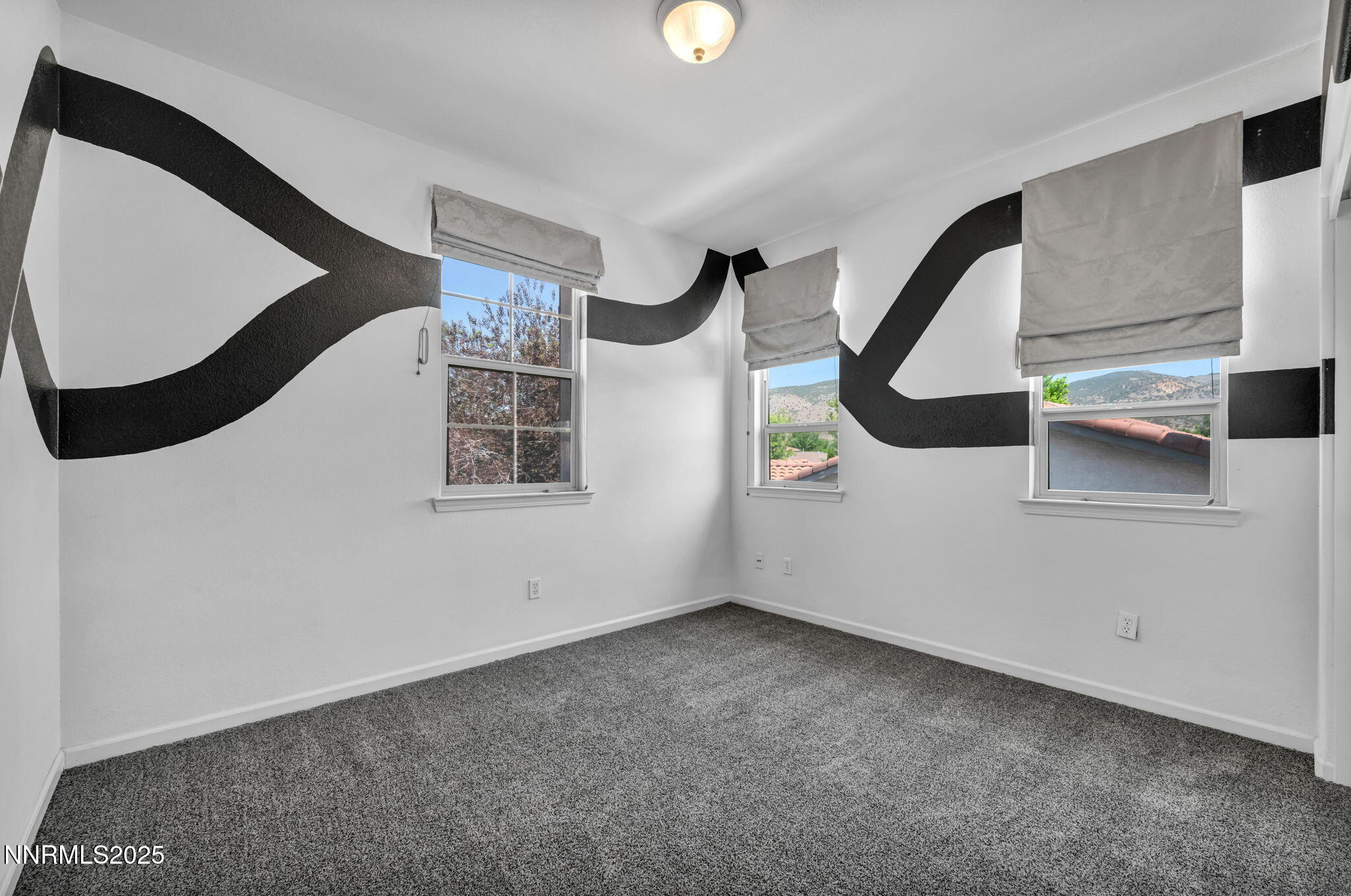 420 Miesque Court Reno, NV 89521 - Photo 26 of 43 a view of a livingroom with wooden floor and windows