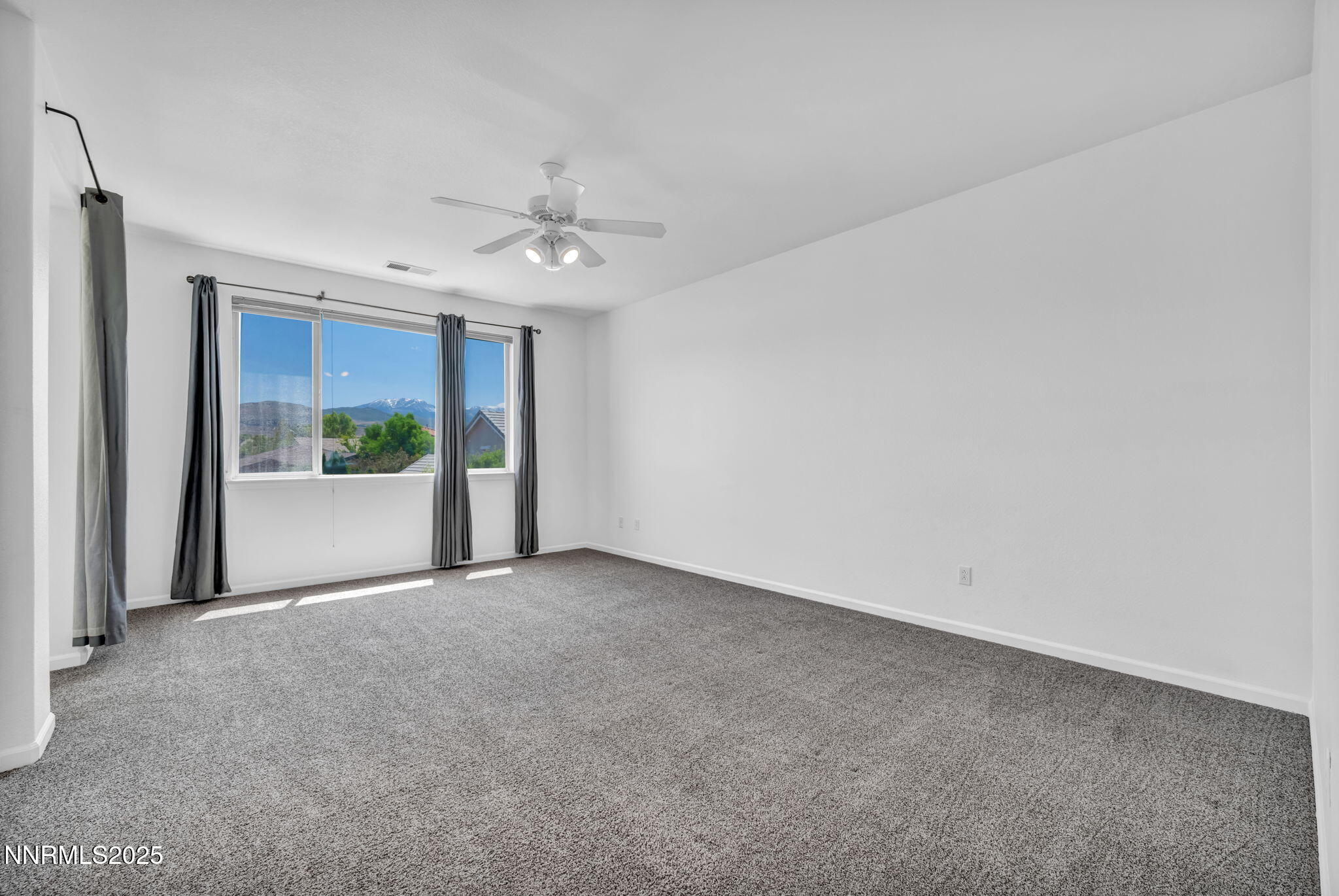 420 Miesque Court Reno, NV 89521 - Photo 31 of 43 a view of an empty room with a window
