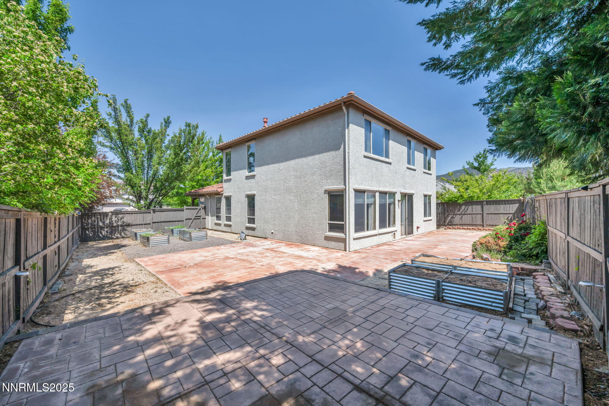 420 Miesque Court Reno, NV 89521 - Photo 40 of 43 a backyard of a house with barbeque oven table and chairs
