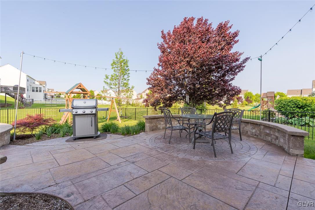 1649 Bridgeton Road Breinigsville, PA 18031 - Photo 17 of 20 Large patio and backyard with fence and shed.