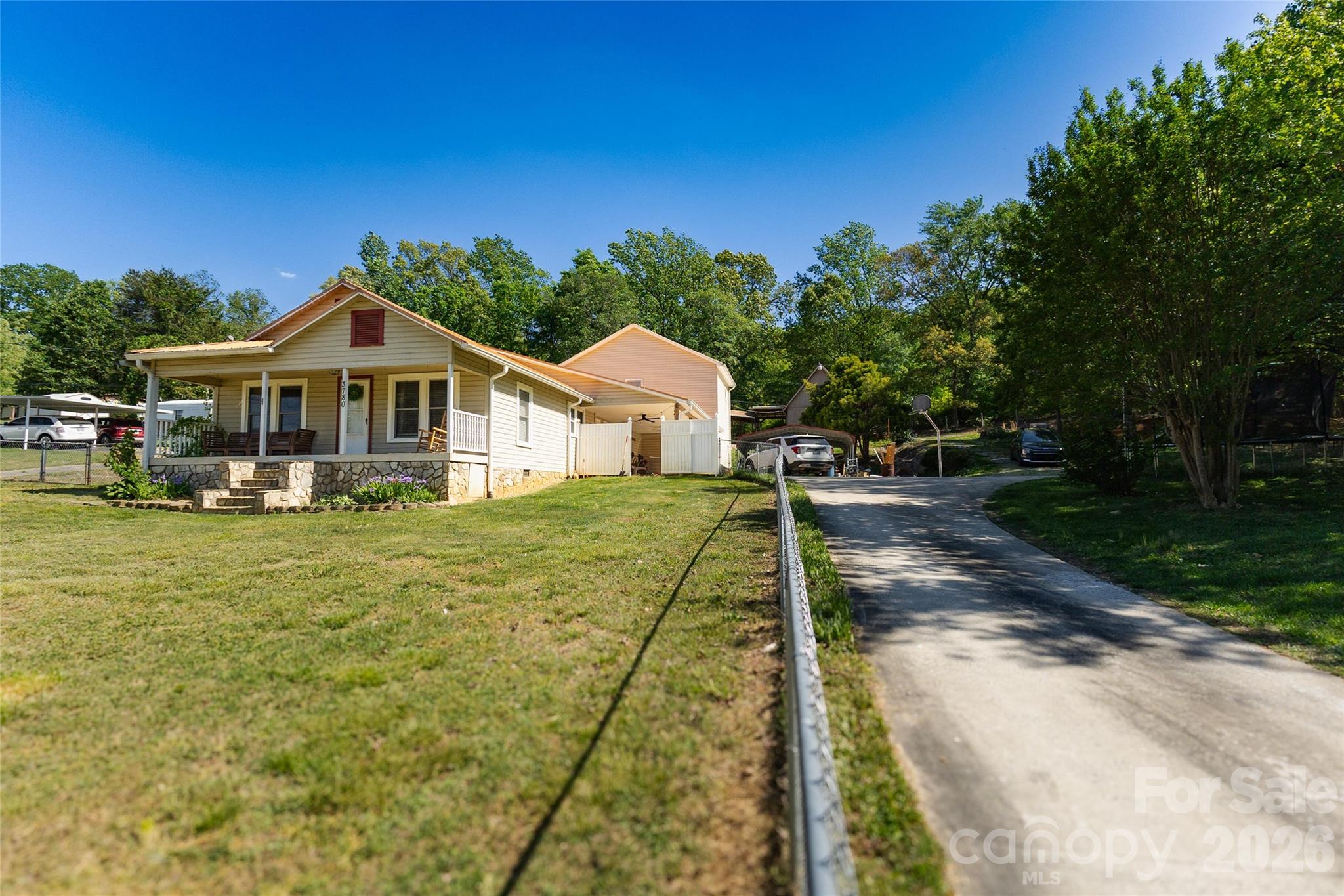 3780 Cook Road Valdese, NC 28690 - Photo 3 of 47 a front view of a house with a yard