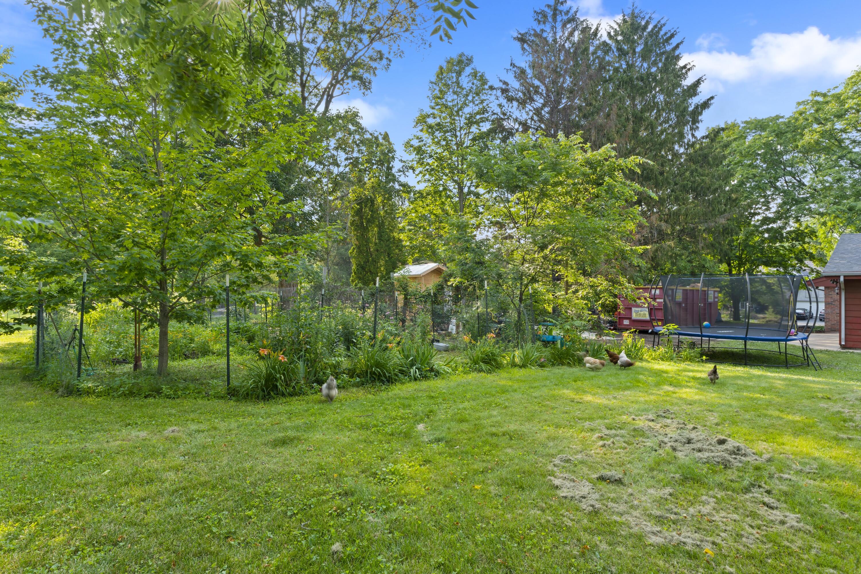 N8093 Lakeview Road Oconomowoc, WI 53066 - Photo 40 of 44 Fenced in established gardens with chicken coop included.