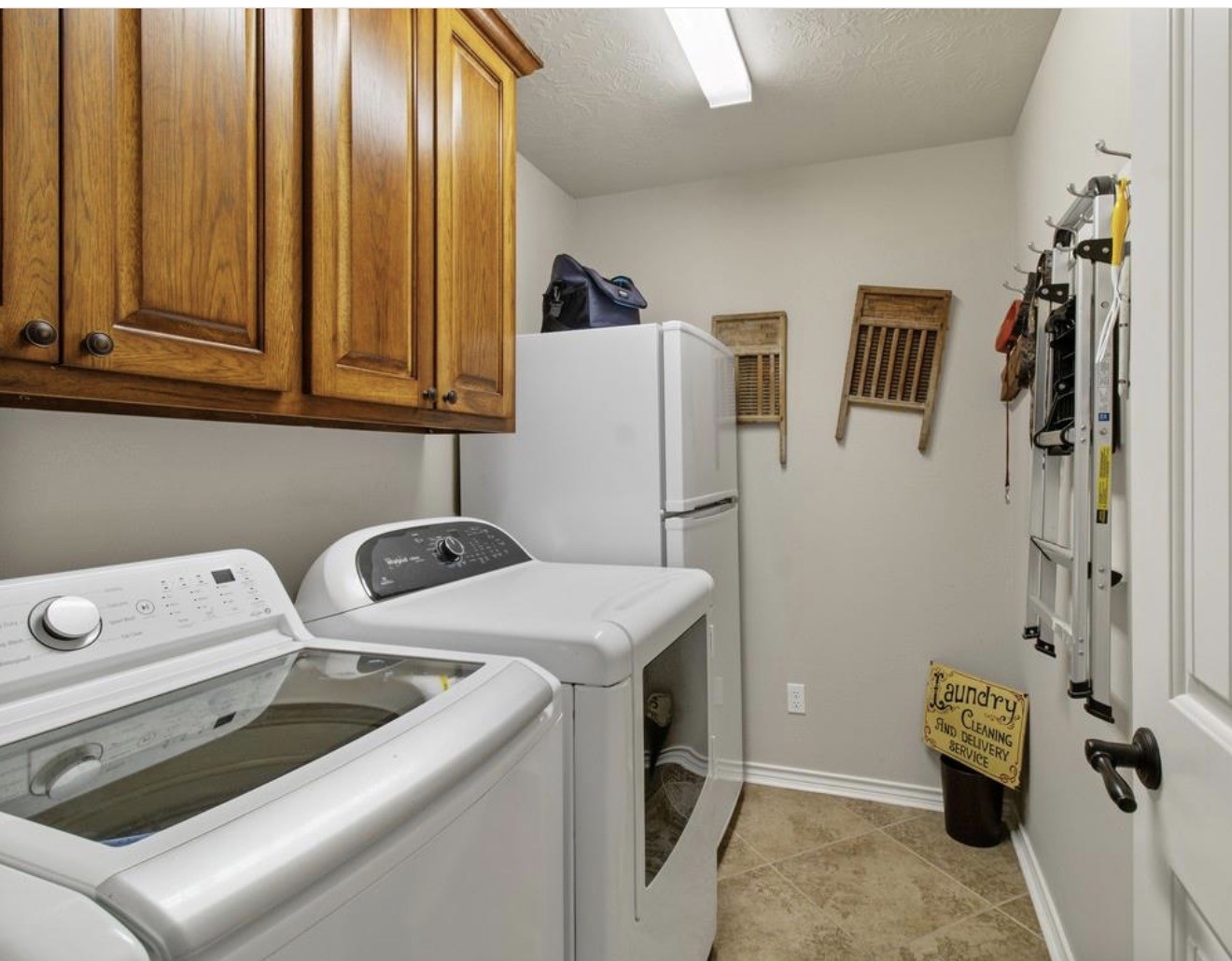 5177 PR 4052 Normangee, TX 77871 - Photo 14 of 20 a utility room with dryer and washer