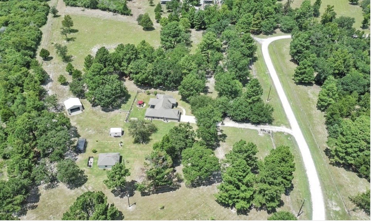 5177 PR 4052 Normangee, TX 77871 - Photo 6 of 20 an aerial view of residential house with outdoor space and swimming pool
