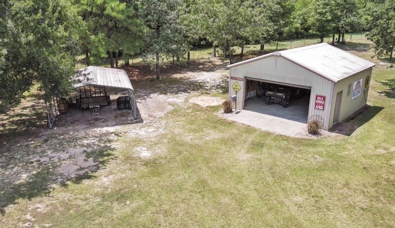 5177 PR 4052 Normangee, TX 77871 - Photo 8 of 20 a backyard of a house with table and chairs
