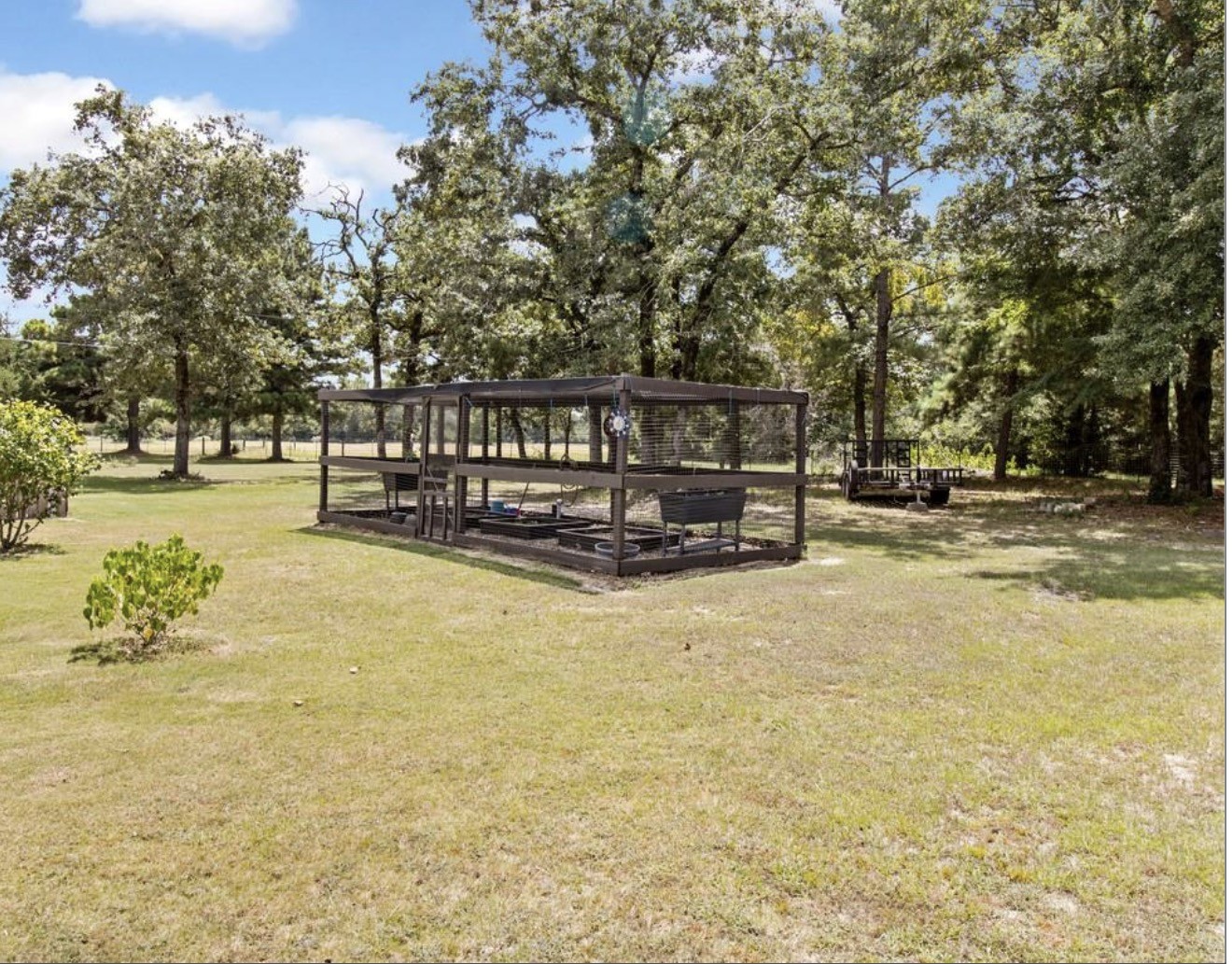 5177 PR 4052 Normangee, TX 77871 - Photo 9 of 20 a view of swimming pool with lawn chairs and iron fence