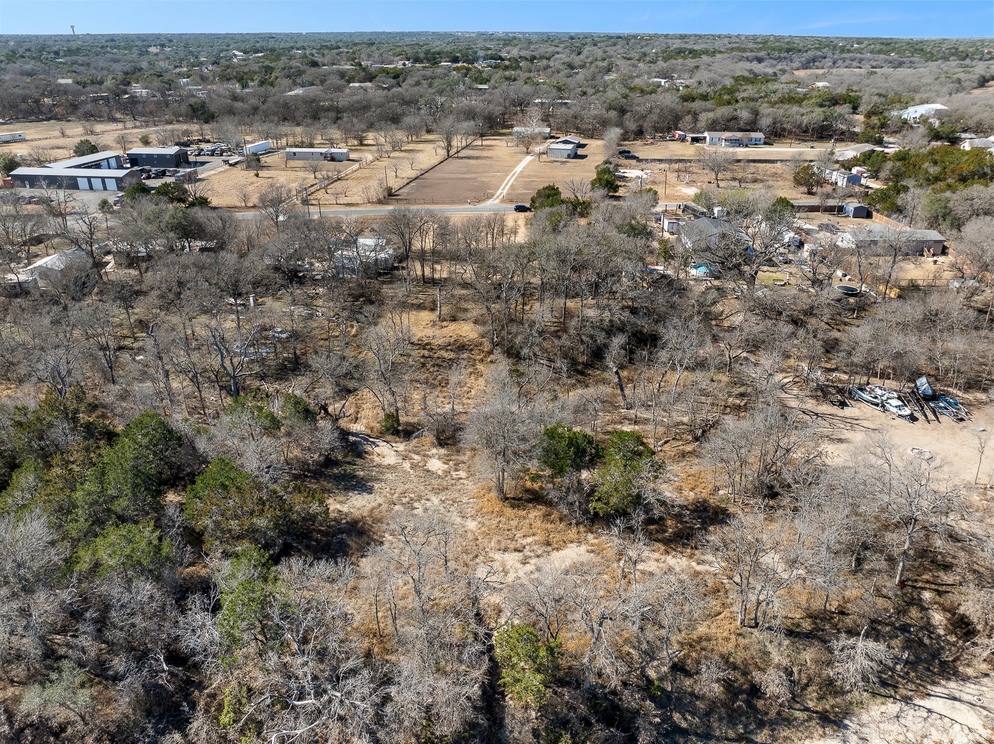 145 River Road Liberty Hill, TX 78642 - Photo 11 of 27 an aerial view of multiple house with a yard