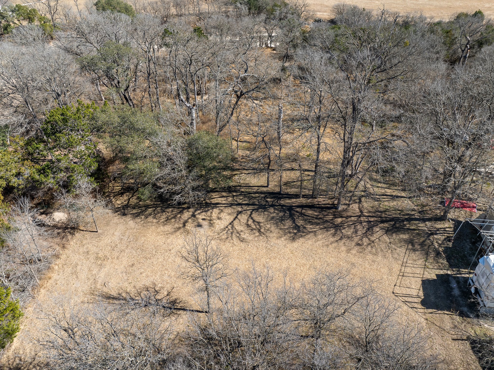 145 River Road Liberty Hill, TX 78642 - Photo 6 of 27 a view of backyard of a house
