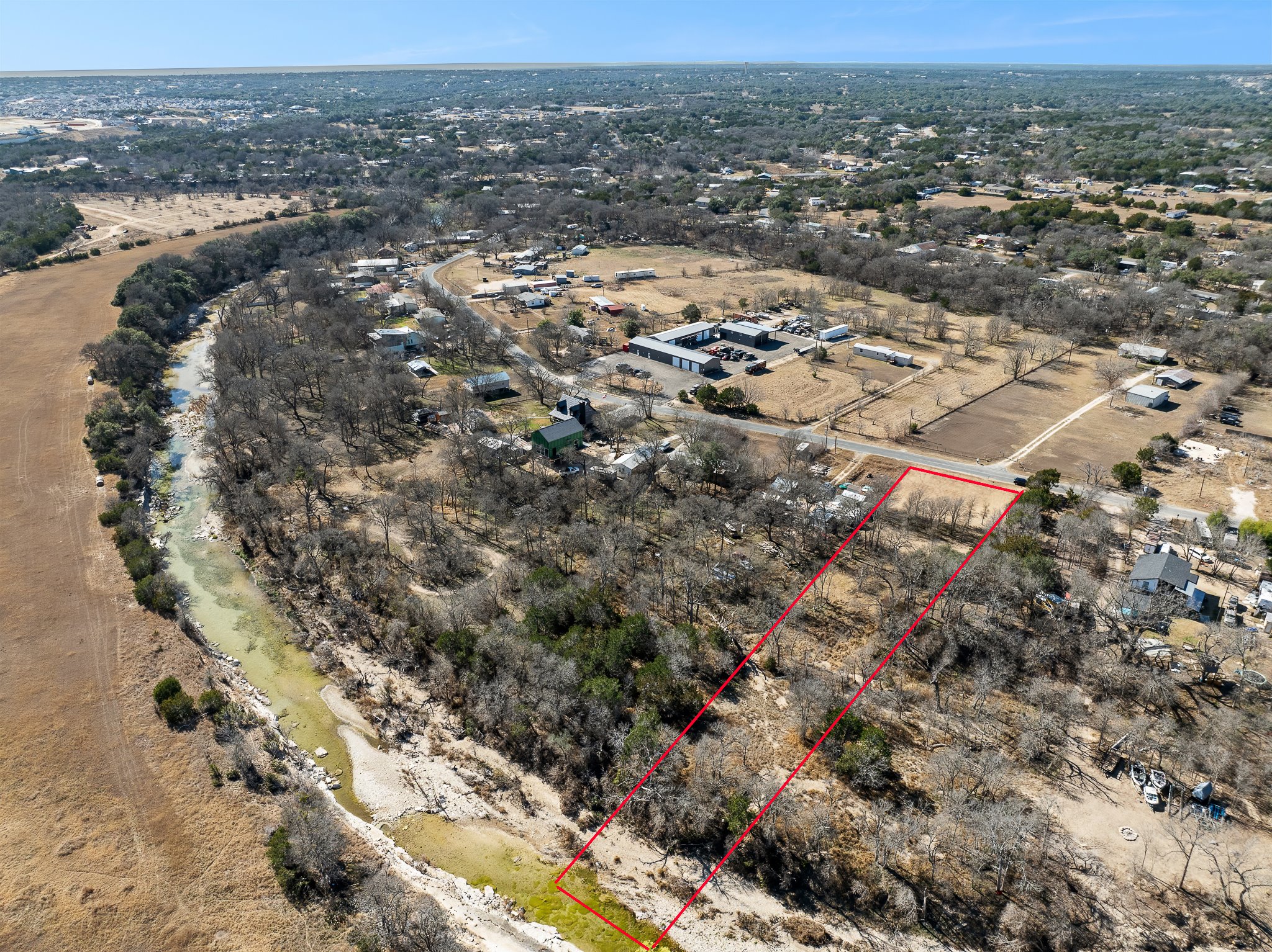 145 River Road Liberty Hill, TX 78642 - Photo 9 of 27 an aerial view of residential houses with outdoor space