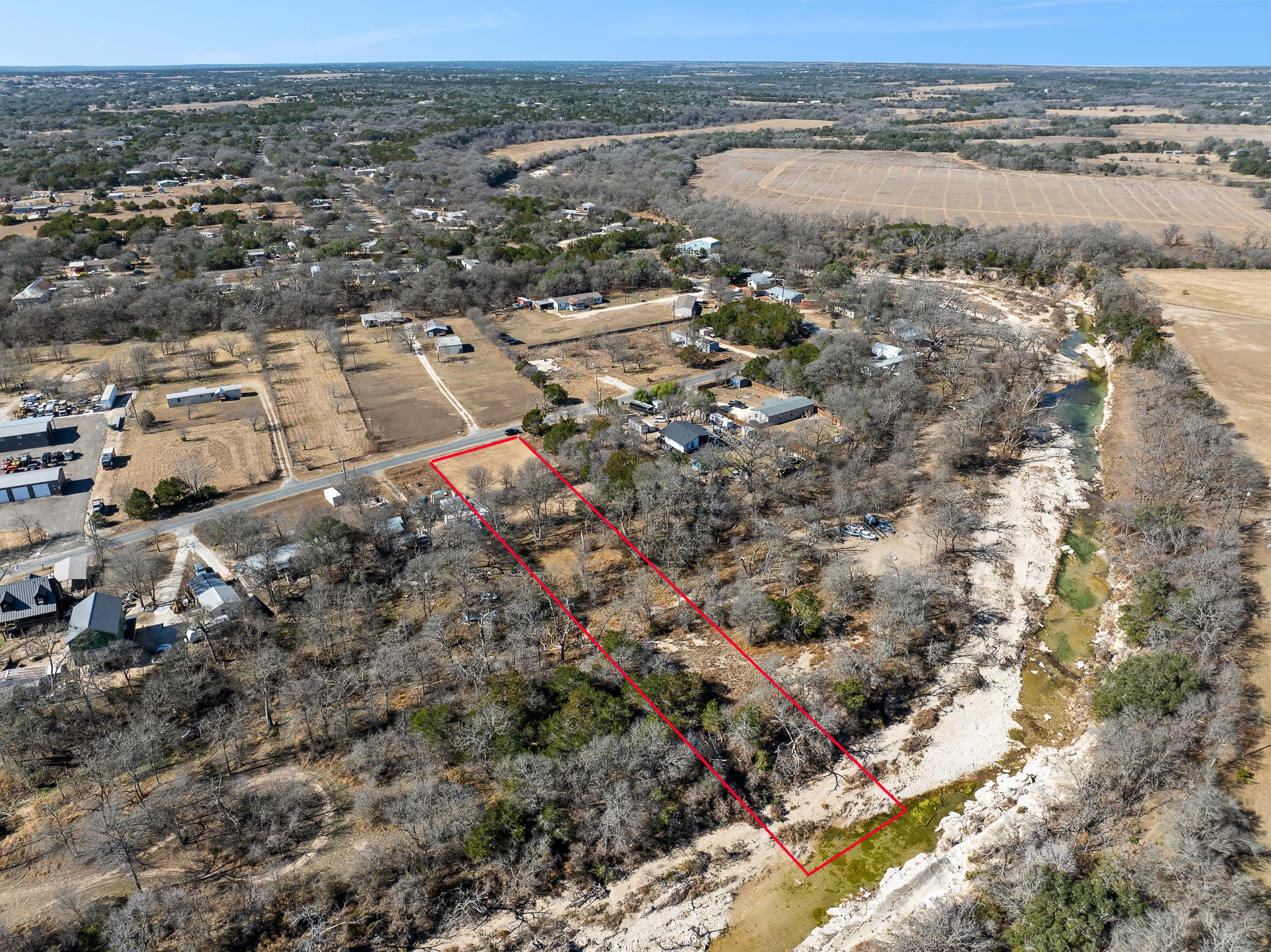 145 River Road Liberty Hill, TX 78642 - Photo 10 of 27 an aerial view of a houses with beach and ocean view