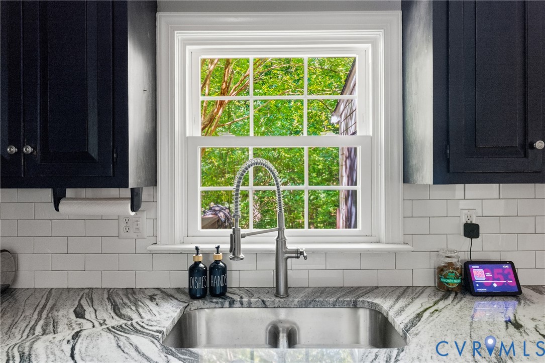 14321 Crossings Ridge Drive Midlothian, VA 23113 - Photo 14 of 43 a kitchen with a sink and a window