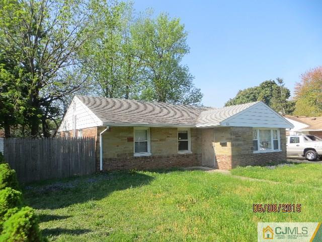 239 Old Post Road Edison, NJ 08817 - Photo 1 of 1 a front view of a house with a garden and yard