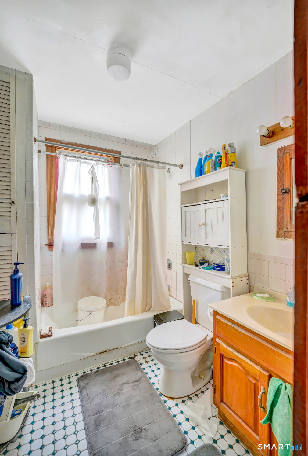 43 Evans Street Torrington, CT 06790 - Photo 11 of 17 a bathroom with a sink toilet and shower