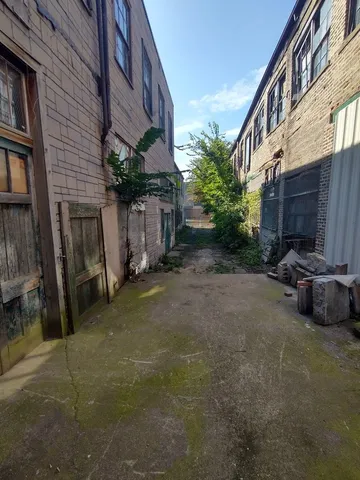 a view of parking with cars parked