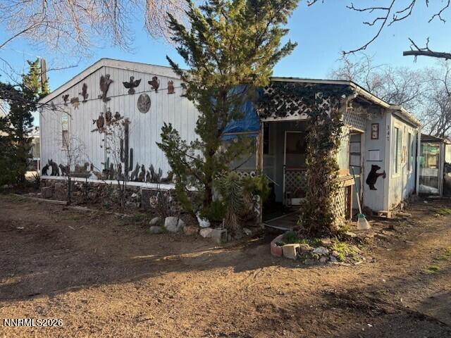 347 Short Avenue Sun Valley, NV 89433 - Photo 1 of 29 a front view of a house
