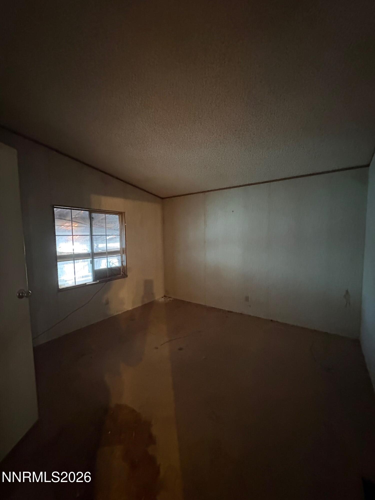 347 Short Avenue Sun Valley, NV 89433 - Photo 14 of 29 a view of an empty room and window
