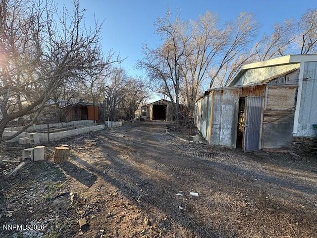 347 Short Avenue Sun Valley, NV 89433 - Photo 23 of 29 a view of a house with a large tree
