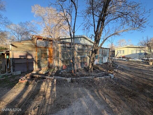 347 Short Avenue Sun Valley, NV 89433 - Photo 25 of 29 a view of a street with a tree