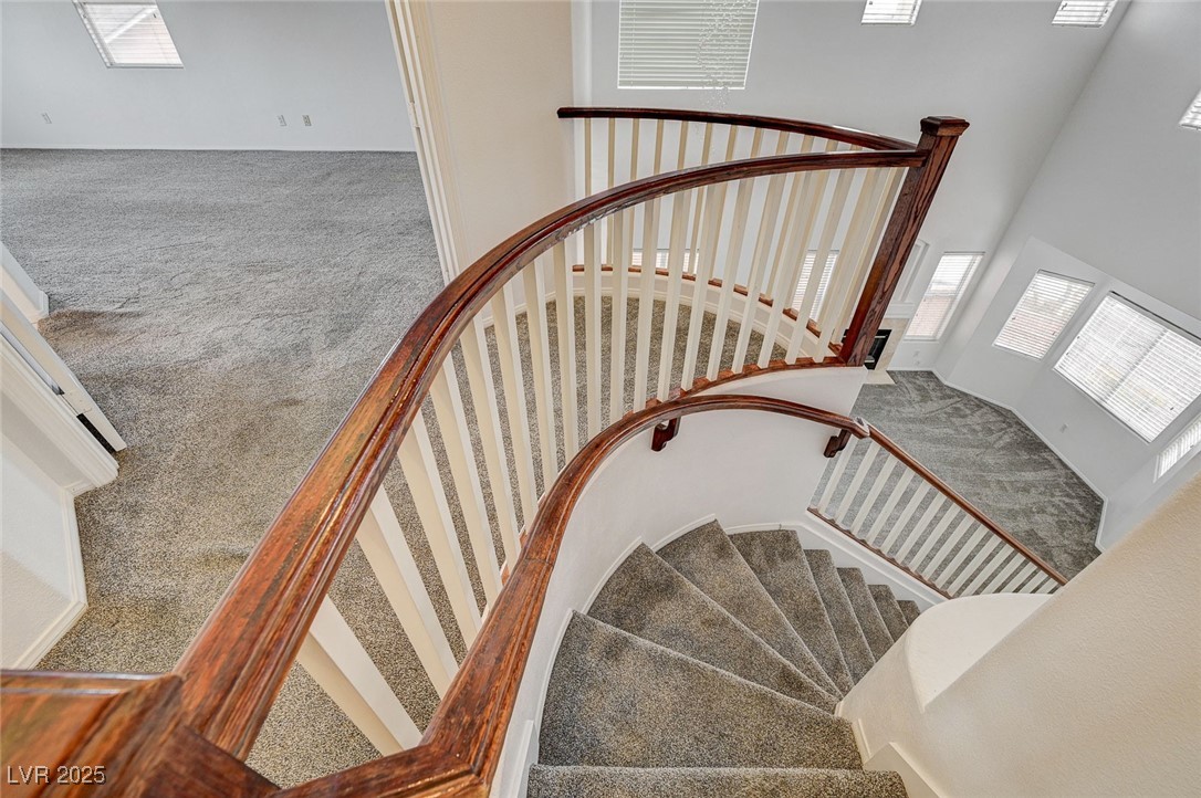 6012 Prospector Trail Las Vegas, NV 89118 - Photo 34 of 73 Staircase with carpet flooring