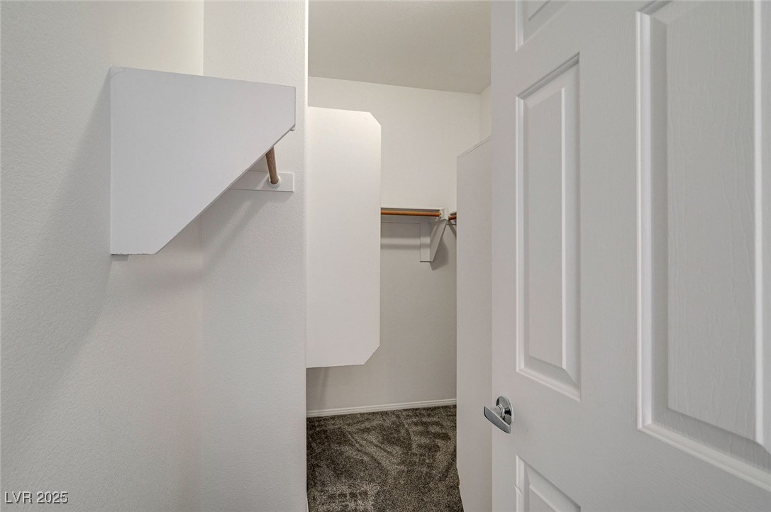 6012 Prospector Trail Las Vegas, NV 89118 - Photo 44 of 73 Spacious closet featuring dark colored carpet