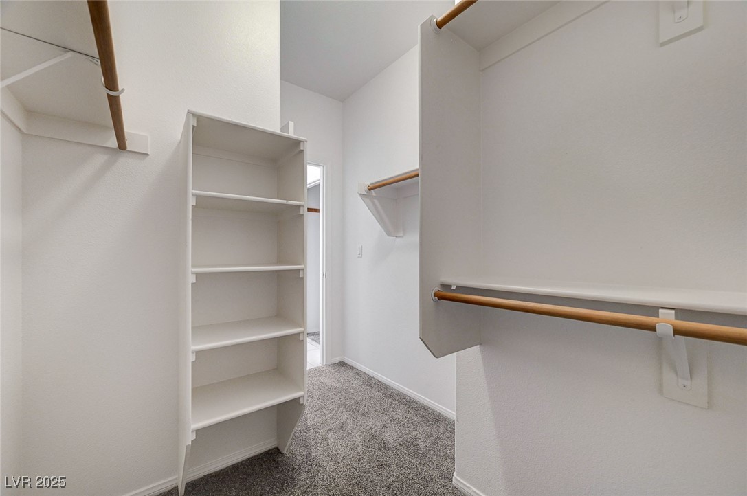 6012 Prospector Trail Las Vegas, NV 89118 - Photo 46 of 73 Walk in closet featuring light carpet