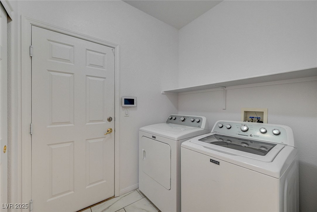 6012 Prospector Trail Las Vegas, NV 89118 - Photo 59 of 73 Laundry area featuring washer and clothes dryer